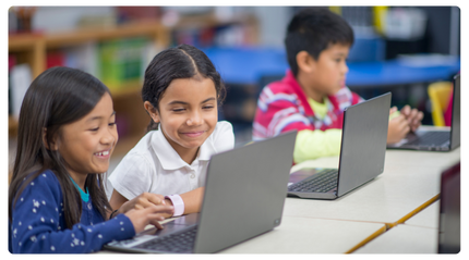 Kids learning on laptops